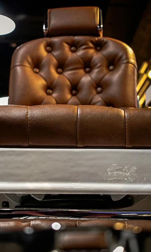 Tufted brown leather barber chair